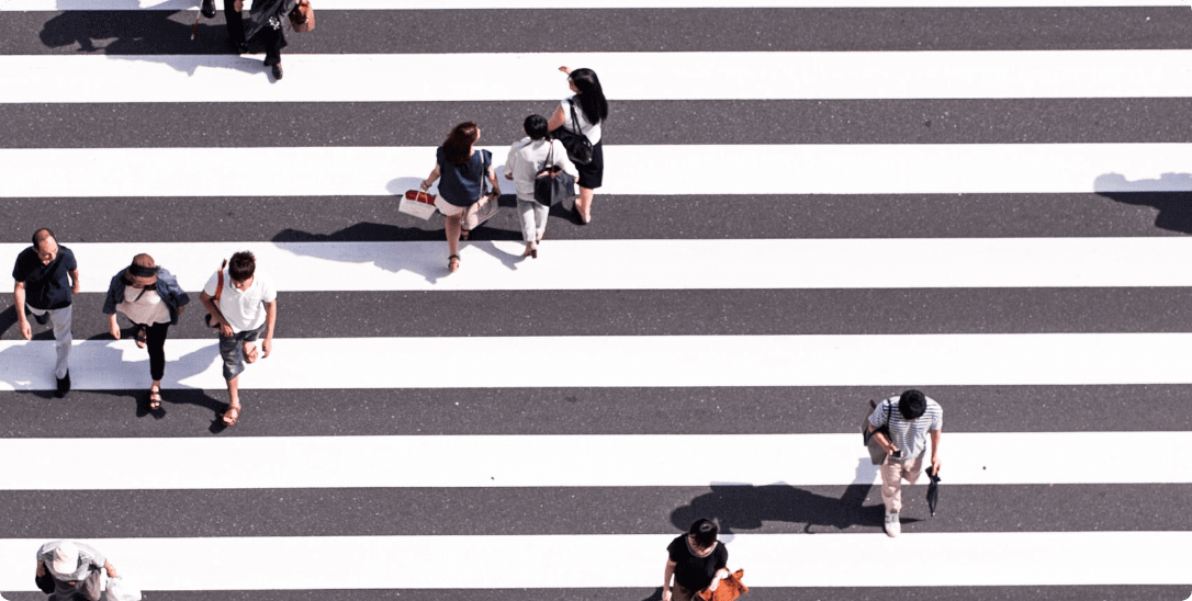 Birdseye view of a zebra crossing.